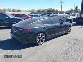2018 Kia Stinger GT2 with VIN KNAE55LC9J6016753, listed as a IAAI auction lot 41408216 with 117,268 mi miles. Bid and sale history available at carsss.com. Image 4.