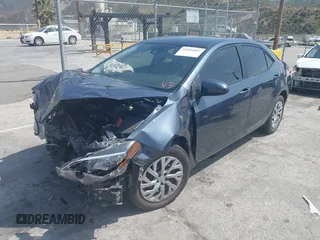2019 Toyota Corolla L z VIN 2T1BURHE4KC215942, wystawiony jako IAAI lot #42104097 z przebiegiem 87 020 mil mil oraz . Historia ofert i sprzedaży dostępna na DreamBid. Obrazek 2.