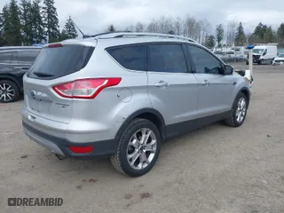 2015 Ford Escape Titanium with VIN 1FMCU9JX2FUB08134, listed as a IAAI auction lot 41839666 with 125,713 mi miles. Bid and sale history available at carsss.com. Image 4.