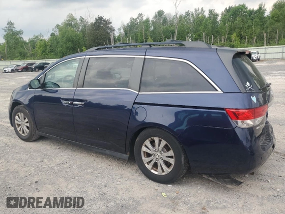 2014 Honda Odyssey EX-L with VIN 5FNRL5H63EB013483, listed as a Copart auction lot 63002435 with 127,059 mi miles and Salvage title. Bid and sale history available at DreamBid. Image 2.