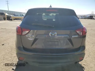 2016 Mazda CX-5 Sport with VIN JM3KE4BY3G0907976, listed as a Copart auction lot 85238414 with 92,933 mi miles and Salvage title. Bid and sale history available at DreamBid. Image 6.