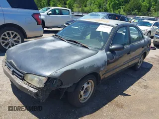 1997 Geo Prizm LSi z VIN 1Y1SK5267VZ447232, wystawiony jako IAAI lot #42289597 z przebiegiem 100 974 mil mil oraz . Historia ofert i sprzedaży dostępna na DreamBid. Obrazek 2.