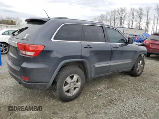 2013 Jeep Grand Cherokee Laredo with VIN 1C4RJFAG6DC630354, listed as a Copart auction lot 49773425 with 113,291 mi miles and Salvage Title. Bid and sale history available at carsss.com. Image 3.