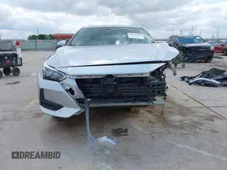2023 Nissan Sentra S z VIN 3N1AB8BV7PY311515, wystawiony jako IAAI lot #42038589 z przebiegiem 13 907 mil mil oraz . Historia ofert i sprzedaży dostępna na DreamBid. Obrazek 13.