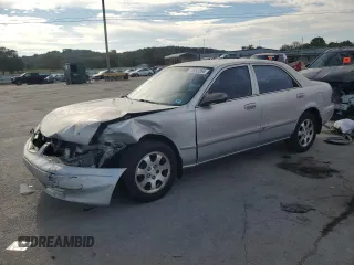 2000 Mazda 626 LX with VIN 1YVGF22C3Y5126135, listed as a Copart auction lot 70650264 with 154,517 mi miles and Salvage Title. Bid and sale history available at carsss.com. Image 1.