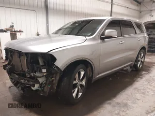 2014 Dodge Durango R/T with VIN 1C4SDJCTXEC558937, listed as a IAAI auction lot 41570244 with 174,724 mi miles and . Bid and sale history available at DreamBid. Image 18.