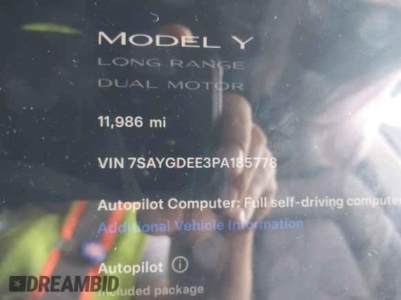 2023 Tesla Model Y Long Range with VIN 7SAYGDEE3PA185778, listed as a IAAI auction lot 39721611 with 11,986 mi miles and . Bid and sale history available at DreamBid. Image 7.