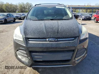 2013 Ford Escape SE with VIN 1FMCU0GX8DUA38056, listed as a Copart auction lot 57617885 with 128,467 mi miles and Salvage title. Bid and sale history available at DreamBid. Image 5.