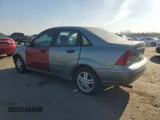2004 Ford Focus SE with VIN 1FAFP34314W127053, listed as a Copart auction lot 48652265 with 241,841 mi miles and Salvage title. Bid and sale history available at DreamBid. Image 2.