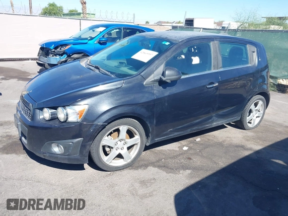 2015 Chevrolet Sonic LTZ with VIN 1G1JE6SB8F4116693, listed as a IAAI auction lot 42865997 with 102,961 mi miles and . Bid and sale history available at DreamBid. Image 6.