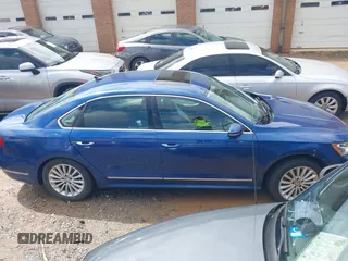 2016 Volkswagen Passat SE z VIN 1VWBT7A38GC009794, wystawiony jako IAAI lot #42246060 z przebiegiem 126 678 mil mil oraz . Historia ofert i sprzedaży dostępna na DreamBid. Obrazek 13.