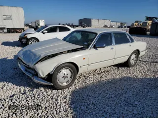 1995 Jaguar XJ with VIN SAJKX1745SC739290, listed as a Copart auction lot 82887524 with Not provided miles and Salvage title. Bid and sale history available at DreamBid. Image 1.
