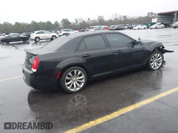 2015 Chrysler 300 C with VIN 2C3CCAEG8FH786879, listed as a IAAI auction lot 41563321 with 130,060 mi miles and . Bid and sale history available at carsss.com. Image 4.