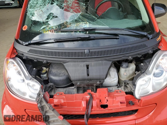 2009 Smart fortwo Pure with VIN WMEEJ31X79K249060, listed as a Copart auction lot 56927145 with Not provided miles and Salvage title. Bid and sale history available at DreamBid. Image 11.