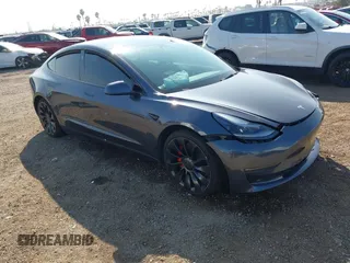 2022 Tesla Model 3 Performance with VIN 5YJ3E1ECXNF264830, listed as a IAAI auction lot 41625494 with Not Provided miles. Bid and sale history available at carsss.com. Image 1.