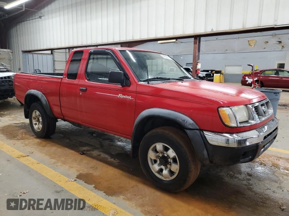 1999 Nissan Frontier XE with VIN 1N6ED26Y5XC308158, listed as a Copart auction lot 84320904 with 316,532 mi miles and Clean title. Bid and sale history available at DreamBid. Image 4.