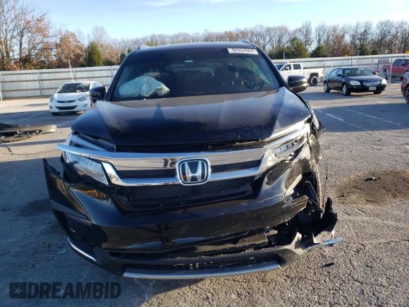 2021 Honda Pilot Touring 8-Passenger with VIN 5FNYF5H94MB039974, listed as a Copart auction lot 82654964 with 54,048 mi miles and Salvage Title. Bid and sale history available at DreamBid. Image 5.