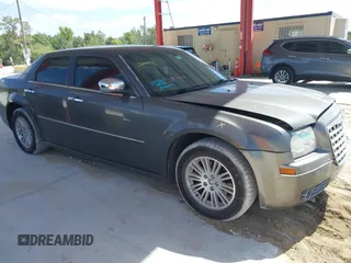 2010 Chrysler 300 Touring with VIN 2C3CA5CV5AH233033, listed as a IAAI auction lot 42130676 with 158,323 mi miles and . Bid and sale history available at DreamBid. Image 13.