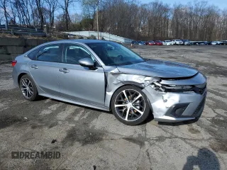 2023 Honda Civic Sedan Touring with VIN 2HGFE1F97PH305185, listed as a Copart auction lot 50556815 with 25,187 mi miles and Salvage Title. Bid and sale history available at carsss.com. Image 4.