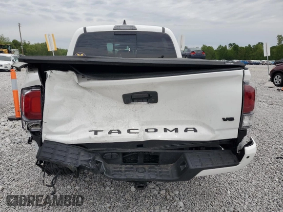 2023 Toyota Tacoma SR z VIN 3TMCZ5AN2PM583382, wystawiony jako Copart lot #58209775 z przebiegiem 17 442 mil mil oraz Szkoda całkowita • Salvage title. Historia ofert i sprzedaży dostępna na DreamBid. Obrazek 6.