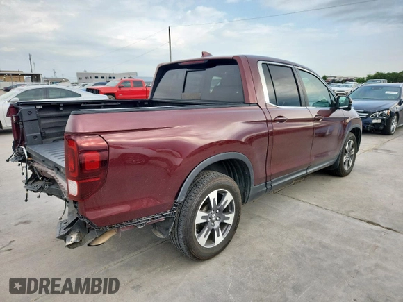 2019 Honda Ridgeline RTL-T with VIN 5FPYK2F60KB002573, listed as a Copart auction lot 63570755 with 111,388 mi miles and Salvage title. Bid and sale history available at DreamBid. Image 3.