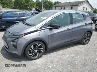 2023 Chevrolet Bolt EV 2LT with VIN 1G1FX6S01P4176797, listed as a Copart auction lot 64389645 with 33,786 mi miles and Salvage title. Bid and sale history available at DreamBid. Image 1.