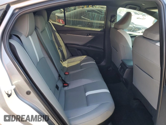 2025 Toyota Camry LE with VIN 4T1DAACK2SU517728, listed as a Copart auction lot 52567455 with 28,385 mi miles and Salvage Title. Bid and sale history available at DreamBid. Image 10.