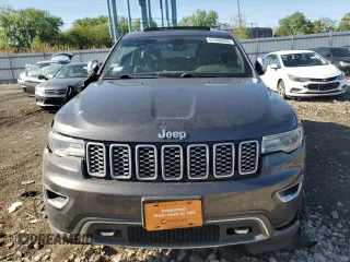 2017 Jeep Grand Cherokee Overland with VIN 1C4RJFCG0HC762612, listed as a Copart auction lot 57400095 with 122,702 mi miles and Salvage title. Bid and sale history available at DreamBid. Image 5.
