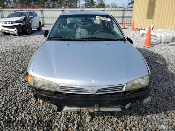 1998 Mitsubishi Mirage DE with VIN JA3AY26A3WU041117, listed as a Copart auction lot 88280675 with 213,243 mi miles and Salvage title. Bid and sale history available at DreamBid. Image 5.