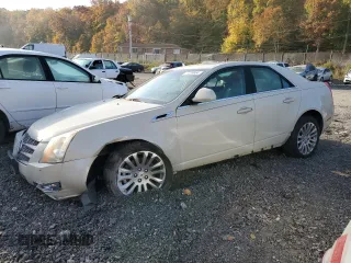 2011 Cadillac CTS Performance with VIN 1G6DL5EDXB0141150, listed as a Copart auction lot 77239964 with 94,084 mi miles and Salvage Title. Bid and sale history available at DreamBid. Image 1.