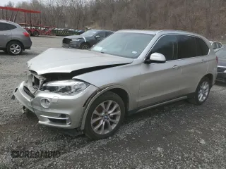 2015 BMW X5 xDrive35i with VIN 5UXKR0C54F0K56946, listed as a Copart auction lot 51717305 with 129,581 mi miles and Clean Title. Bid and sale history available at carsss.com. Image 1.