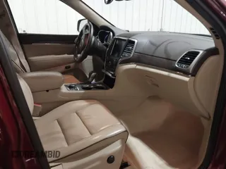 2018 Jeep Grand Cherokee High Altitude with VIN 1C4RJFCG6JC215902, listed as a IAAI auction lot 41866716 with 76,282 mi miles. Bid and sale history available at carsss.com. Image 5.