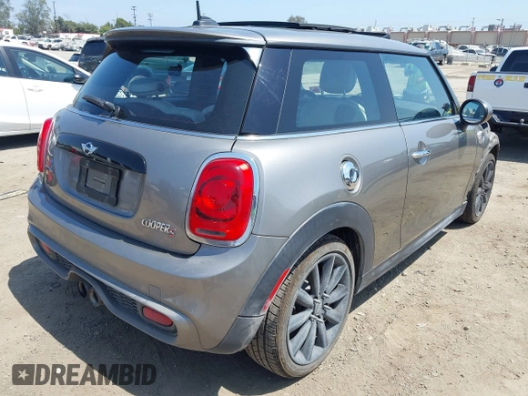 2017 MINI Hardtop Cooper S with VIN WMWXP7C34H2C61768, listed as a IAAI auction lot 42579522 with 67,876 mi miles and . Bid and sale history available at DreamBid. Image 4.