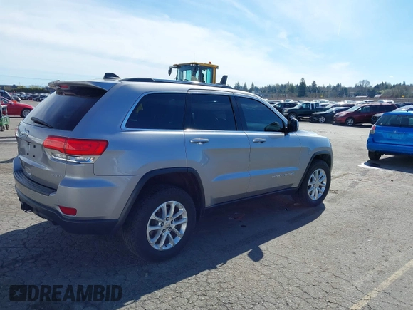 2016 Jeep Grand Cherokee Laredo z VIN 1C4RJFAG7GC392261, wystawiony jako IAAI lot #41890922 z przebiegiem 107 546 mil mil oraz . Historia ofert i sprzedaży dostępna na DreamBid. Obrazek 4.