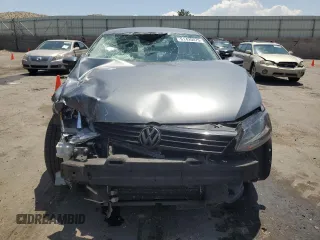 2014 Volkswagen Jetta SE with VIN 3VWD17AJ2EM360824, listed as a Copart auction lot 61420075 with 142,101 mi miles and Salvage title. Bid and sale history available at DreamBid. Image 5.