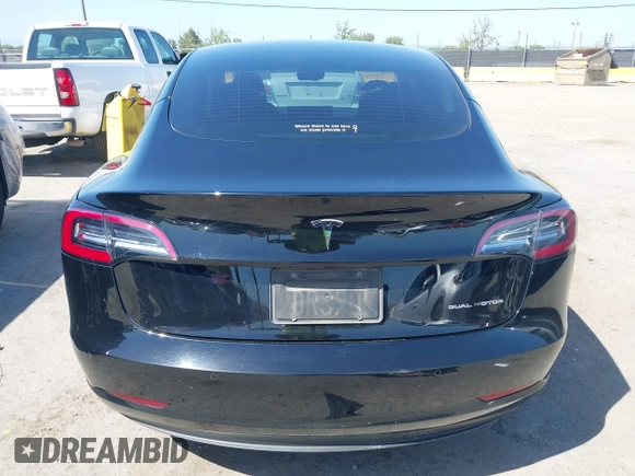 2021 Tesla Model 3 Long Range with VIN 5YJ3E1EB2MF065583, listed as a IAAI auction lot 42067399 with 52,333 mi miles. Bid and sale history available at carsss.com. Image 17.