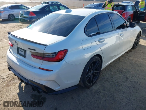 2020 BMW 3 Series M340i with VIN WBA5U7C02LFH69972, listed as a IAAI auction lot 41869845 with 45,926 mi miles. Bid and sale history available at carsss.com. Image 4.
