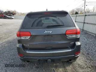 2014 Jeep Grand Cherokee Overland with VIN 1C4RJFCG4EC172361, listed as a Copart auction lot 49053155 with 144,916 mi miles and Salvage Title. Bid and sale history available at DreamBid. Image 6.