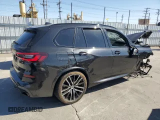 2022 BMW X5 xDrive40i with VIN 5UXCR6C07N9K73293, listed as a Copart auction lot 52586105 with 67,528 mi miles and Salvage Title. Bid and sale history available at DreamBid. Image 3.