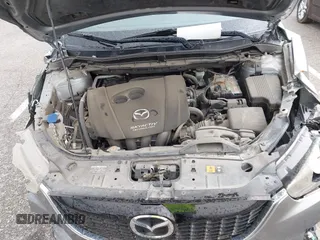 2014 Mazda CX-5 Touring with VIN JM3KE4CY1E0426409, listed as a IAAI auction lot 41924258 with 116,956 mi miles. Bid and sale history available at carsss.com. Image 10.