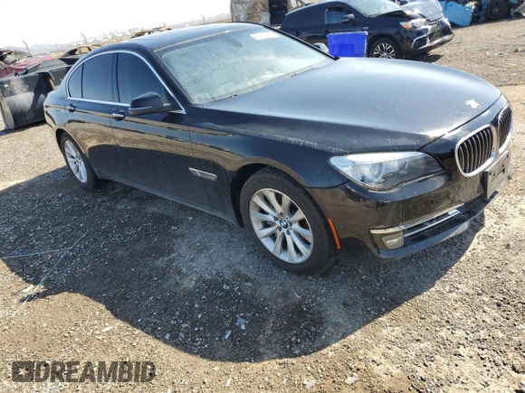2015 BMW 7 Series 740i with VIN WBAYA6C5XFD826895, listed as a Copart auction lot 66889794 with Not Provided miles and Salvage Title. Bid and sale history available at DreamBid. Image 4.