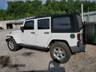 2014 Jeep Wrangler Unlimited Sahara с VIN 1C4BJWEG1EL322781, выставлен на аукционе Copart как лот 64200145 с пробегом 119 500 миль миль и Чистый • Clean title. История ставок и продаж доступна на DreamBid. Изображение 2.