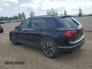 2023 Volkswagen Tiguan S with VIN 3VVFB7AX5PM082907, listed as a Copart auction lot 63643445 with 36,521 mi miles and Salvage title. Bid and sale history available at DreamBid. Image 2.