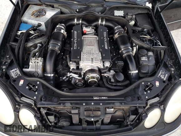 2005 Mercedes-Benz E-Class 5.5L AMG with VIN WDBUF76J05A675937, listed as a Copart auction lot 77349524 with 0 mi miles and Salvage Title. Bid and sale history available at carsss.com. Image 11.