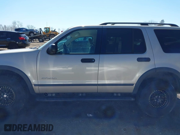 2004 Ford Explorer XLS z VIN 1FMZU72E14UC11599, wystawiony jako IAAI lot #41749597 z przebiegiem 82 805 mil mil oraz . Historia ofert i sprzedaży dostępna na DreamBid. Obrazek 14.