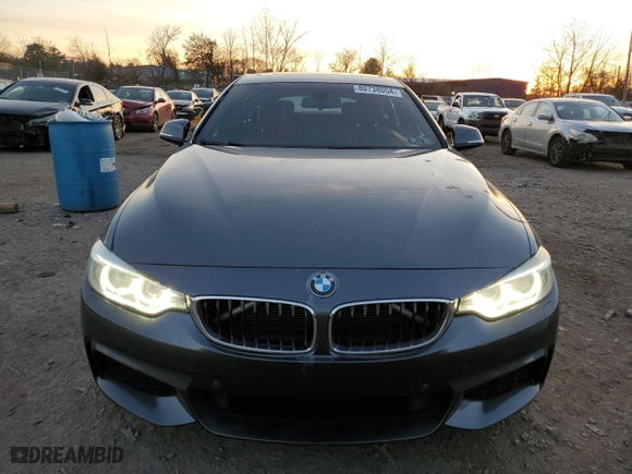 2015 BMW 4 Series 428i xDrive with VIN WBA4C9C5XFD330974, listed as a Copart auction lot 80738054 with 130,644 mi miles and Salvage Title. Bid and sale history available at carsss.com. Image 5.