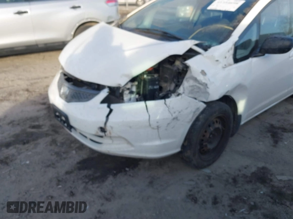 2009 Honda Fit z VIN JHMGE88249S067463, wystawiony jako IAAI lot #41354698 z przebiegiem 153 402 mil mil oraz . Historia ofert i sprzedaży dostępna na DreamBid. Obrazek 6.
