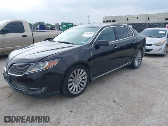 2013 Lincoln MKS with VIN 1LNHL9DK1DG608872, listed as a IAAI auction lot 42672243 with 175,935 mi miles and . Bid and sale history available at DreamBid. Image 2.