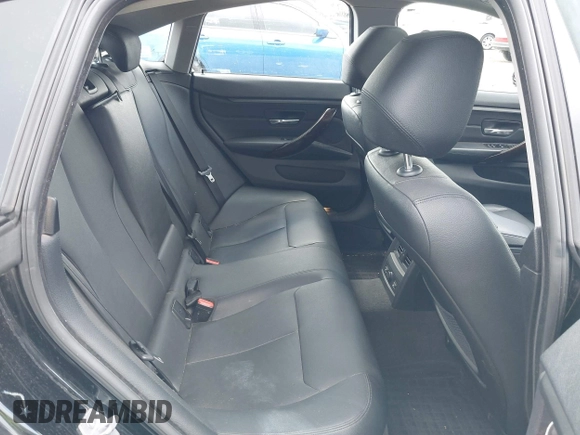 2015 BMW 4 Series 428i xDrive with VIN WBA4C9C52FD331620, listed as a IAAI auction lot 42556526 with 115,674 mi miles and . Bid and sale history available at DreamBid. Image 8.
