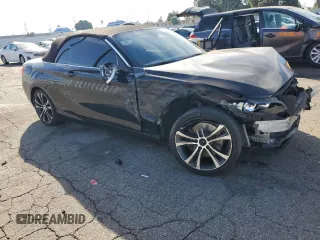 2015 BMW 2 Series 228i with VIN WBA1K5C59FV242992, listed as a Copart auction lot 75433654 with Not provided miles and Salvage title. Bid and sale history available at DreamBid. Image 4.